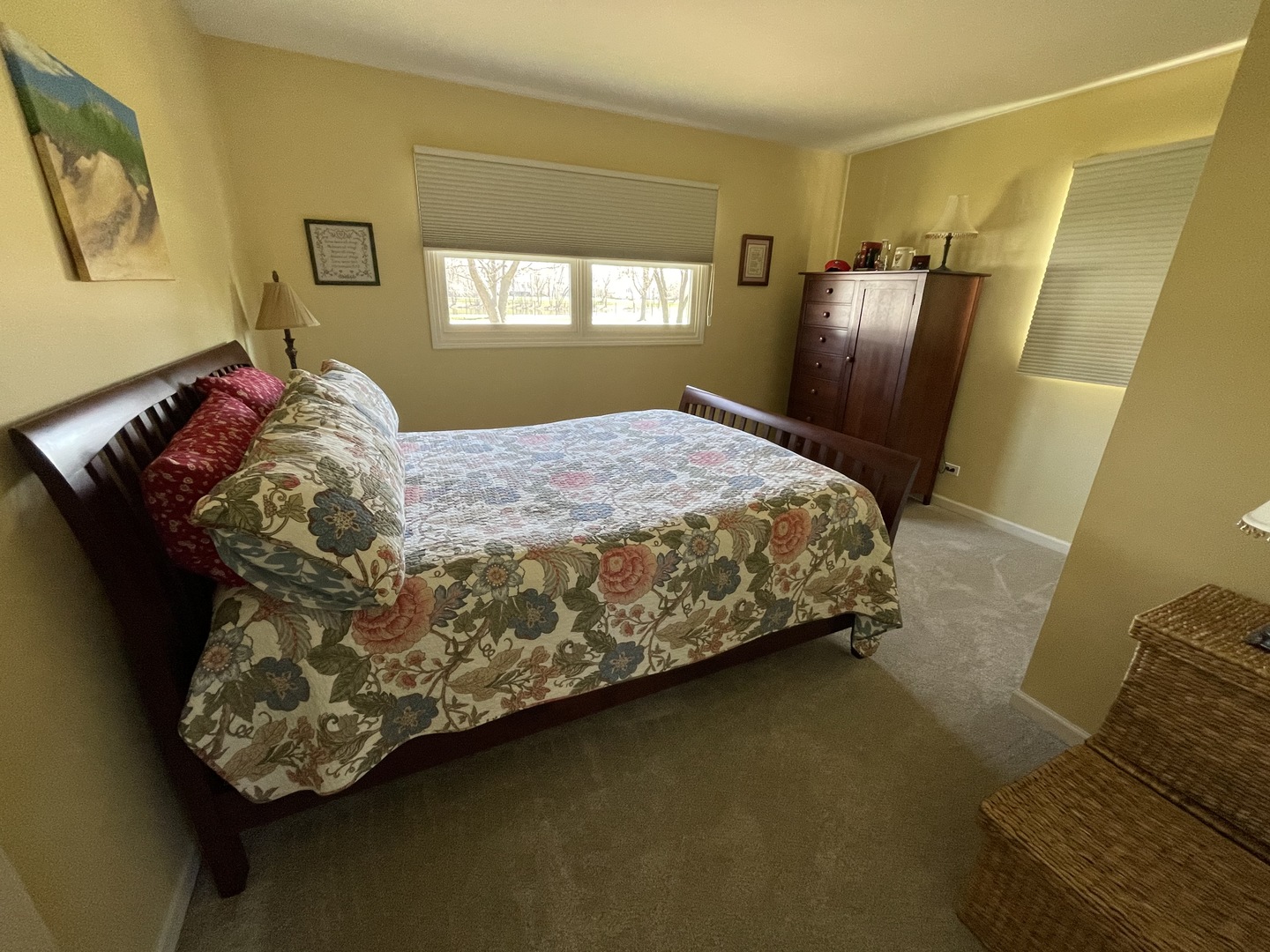 N742 Pleasant Hill Road Wheaton, IL 60187 - Photo 9 of 28 a bed sitting in a bedroom next to a window