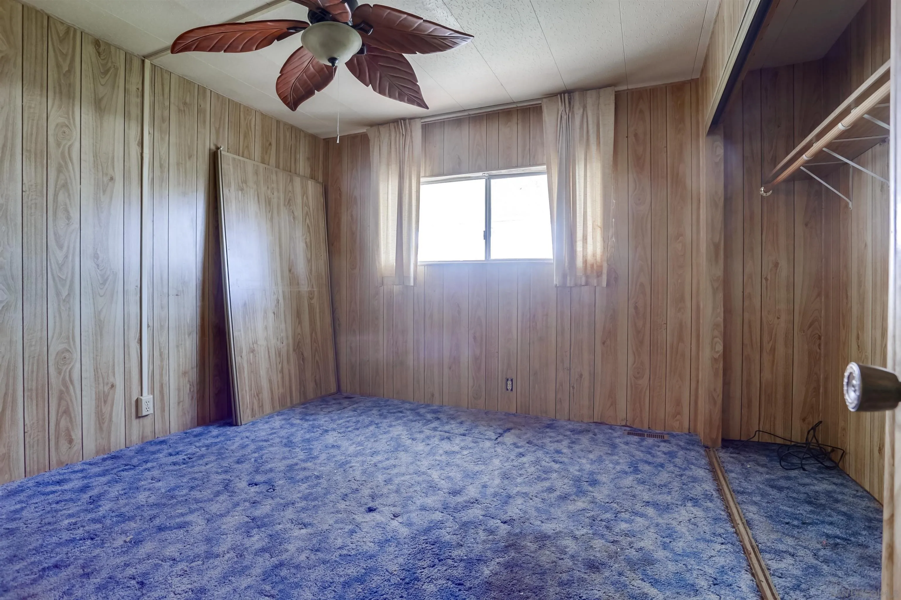 809 Olive Avenue, Unit 11 Vista, CA 92083 - Photo 19 of 26 a view of an empty room and window