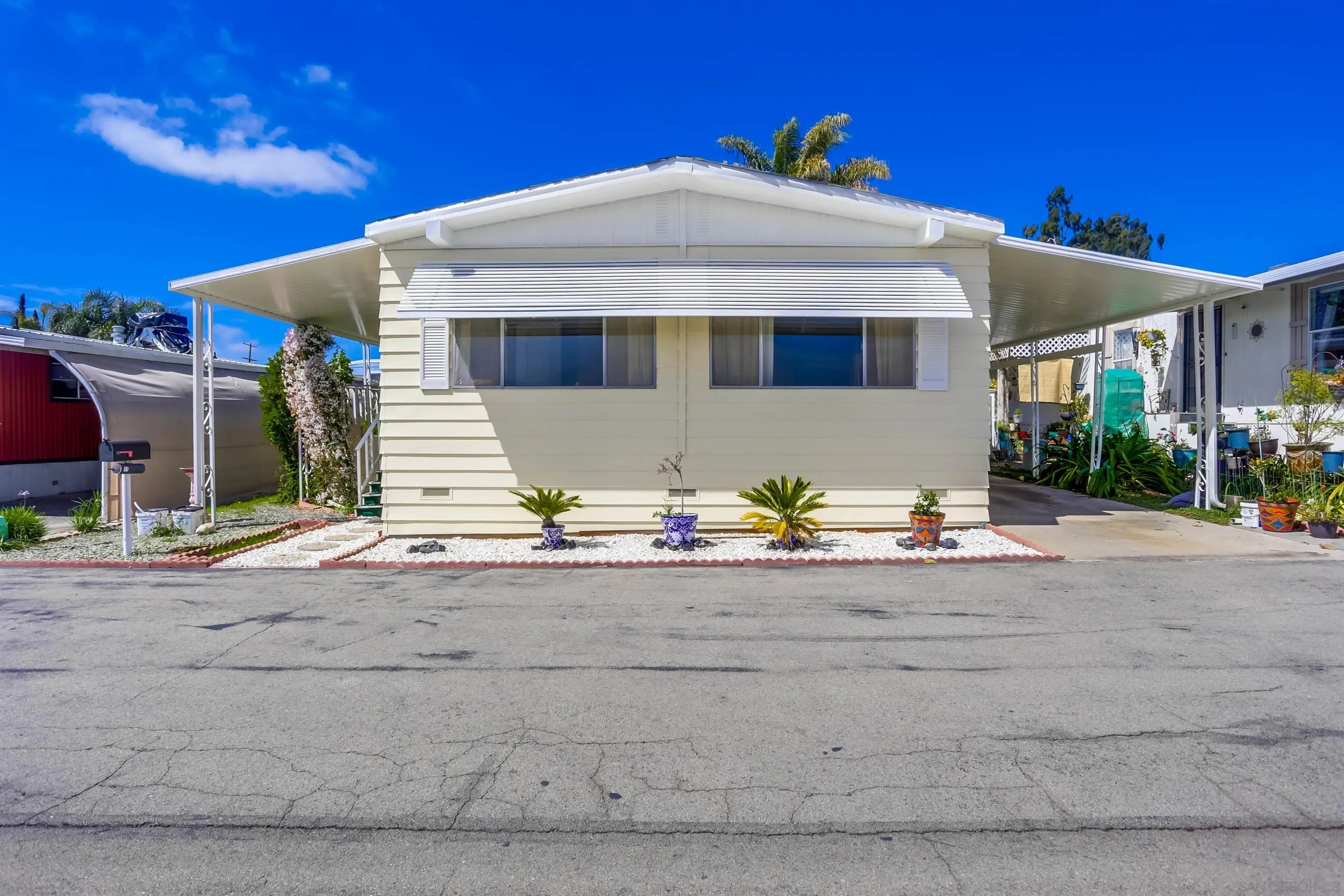 809 Olive Avenue, Unit 11 Vista, CA 92083 - Photo 2 of 26 a front view of a house
