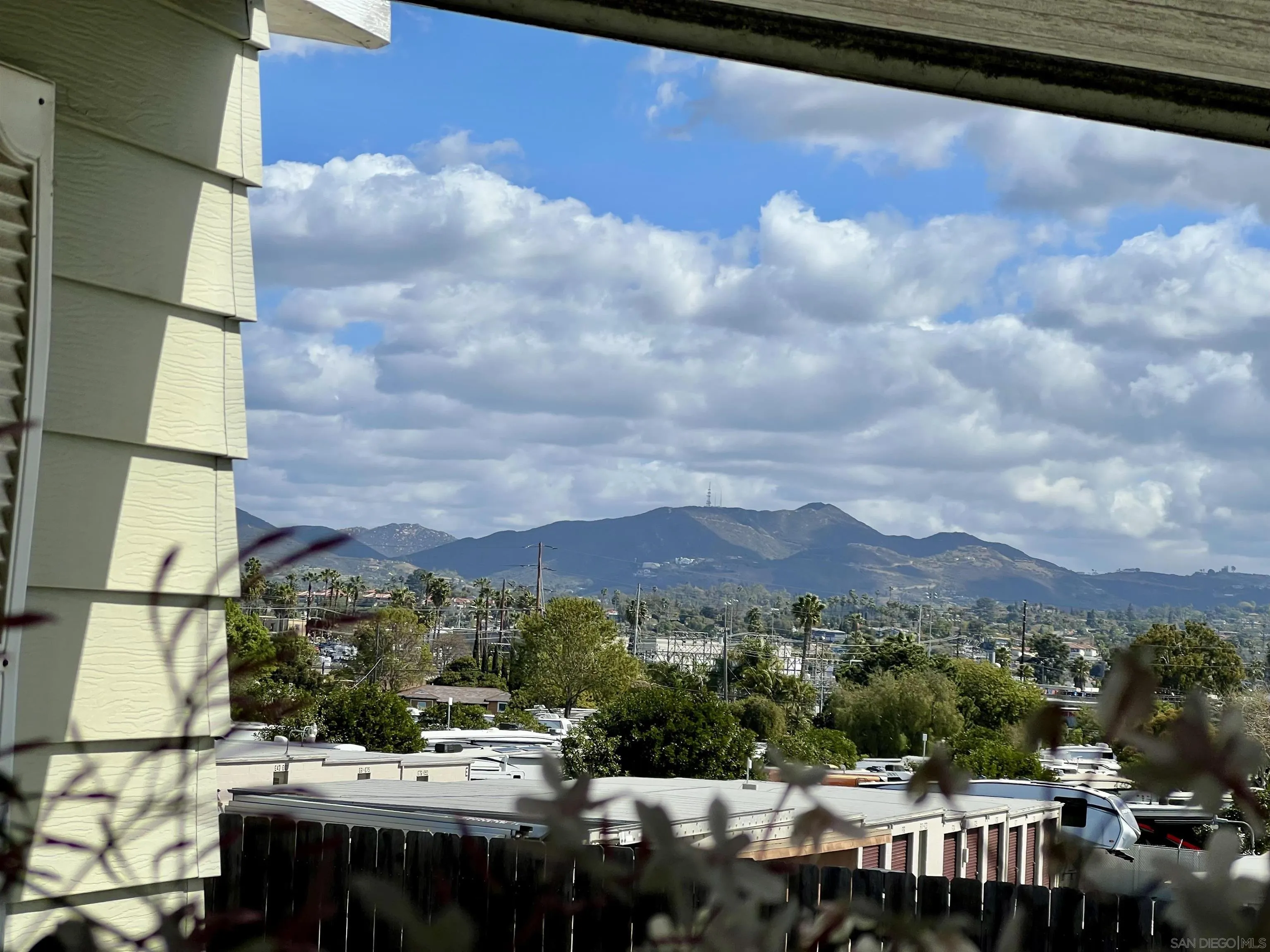 809 Olive Avenue, Unit 11 Vista, CA 92083 - Photo 5 of 26 a view of a lake with a mountain in the background