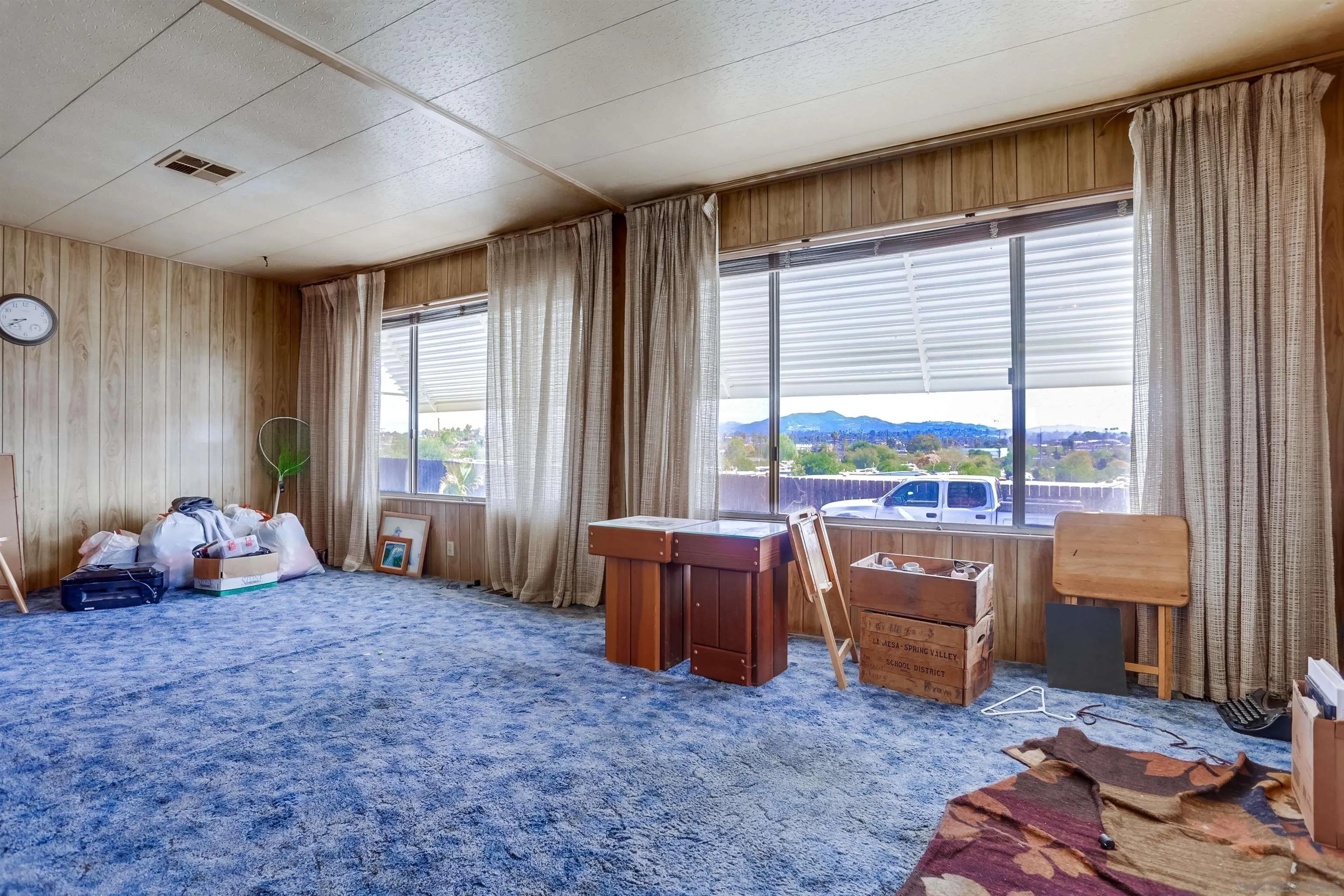 809 Olive Avenue, Unit 11 Vista, CA 92083 - Photo 6 of 26 a living room with furniture and large windows