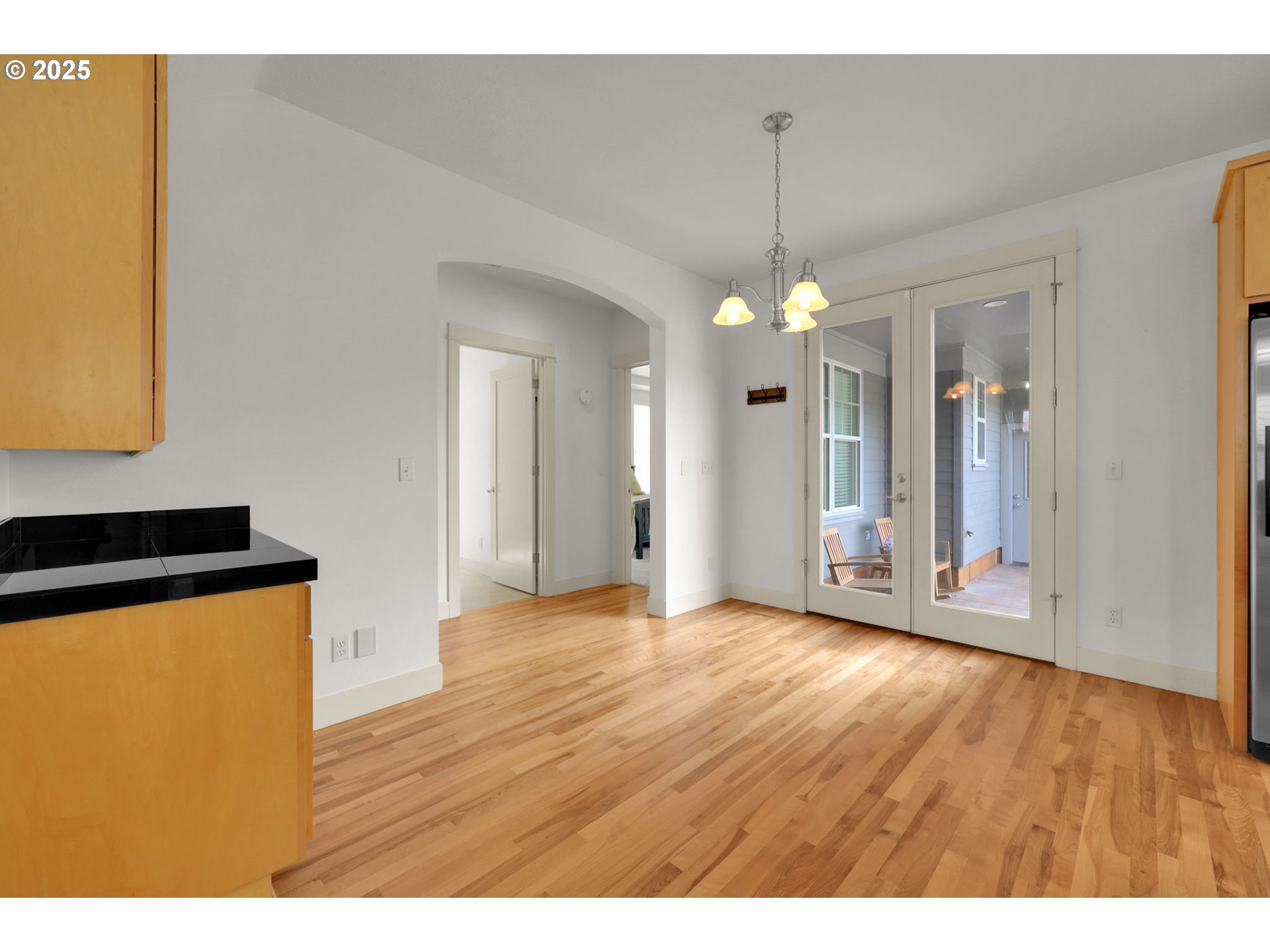 1260 Little John Lane Eugene, OR 97401 - Photo 18 of 44 a view of a room with wooden floor and window