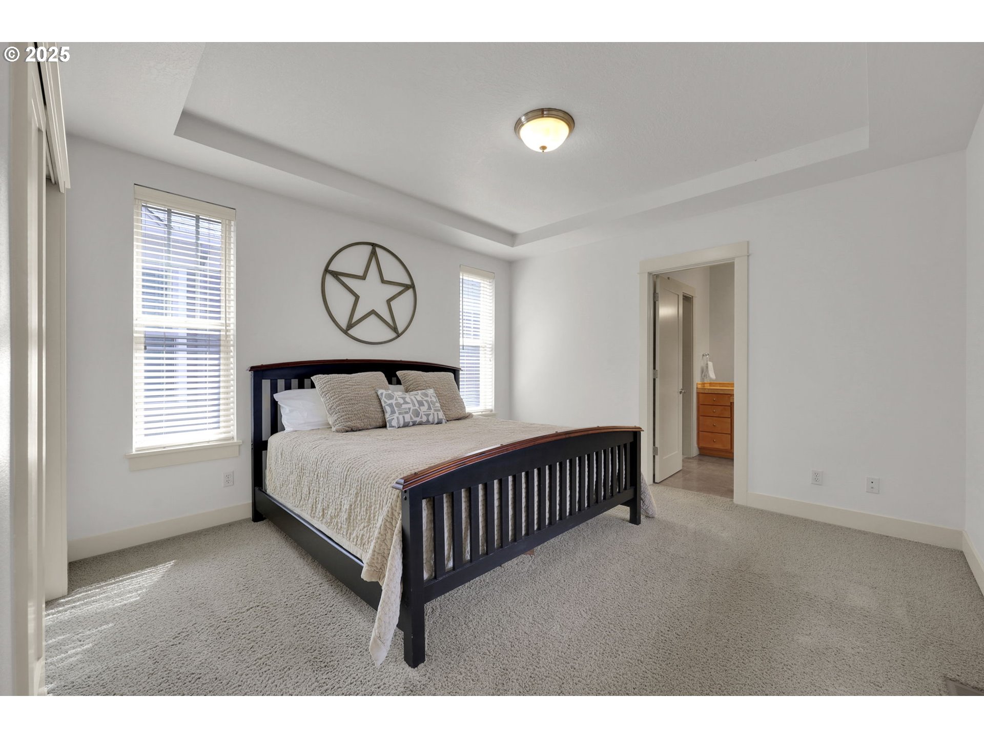 1260 Little John Lane Eugene, OR 97401 - Photo 20 of 44 a bedroom with a bed and window
