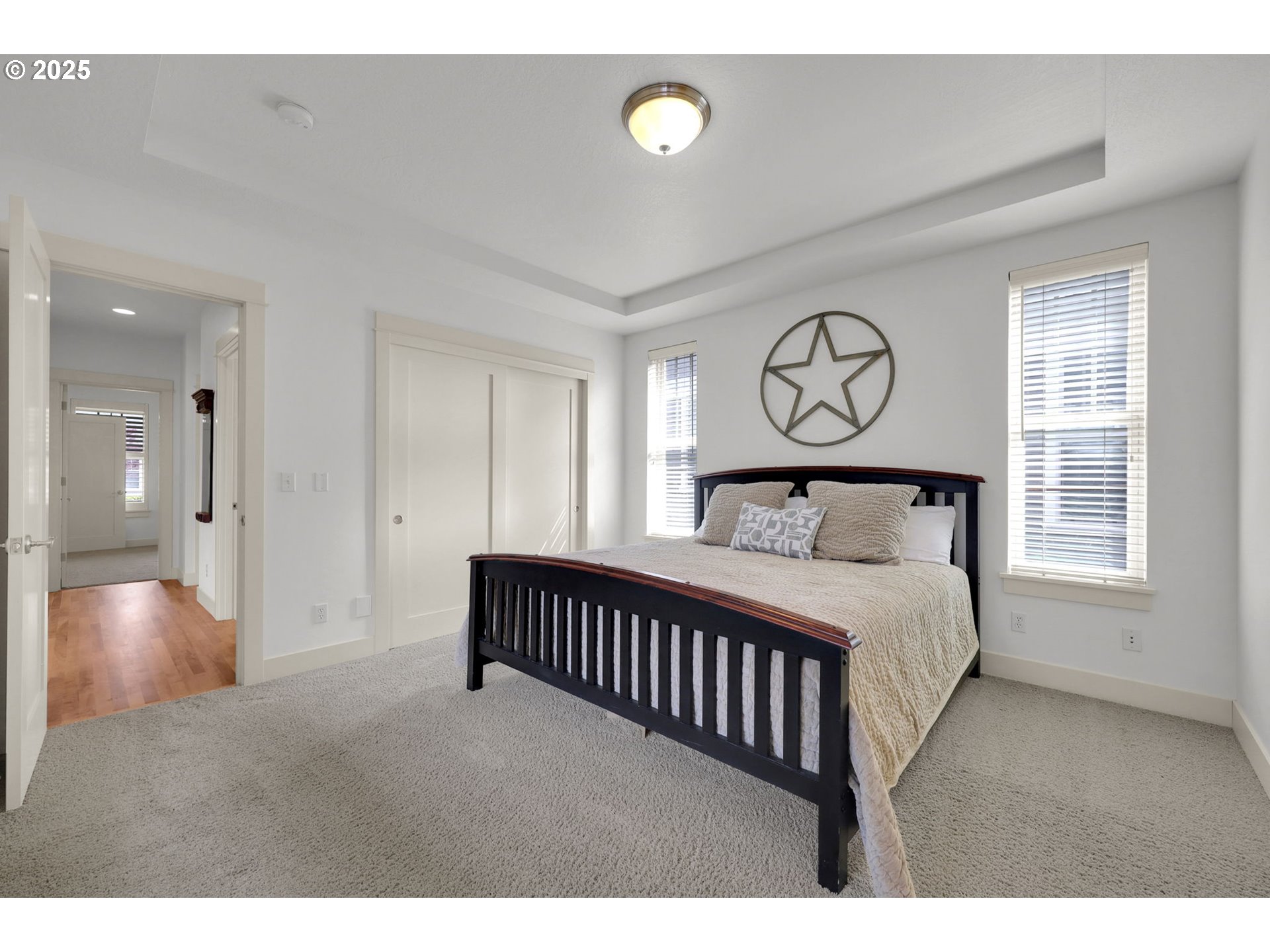 1260 Little John Lane Eugene, OR 97401 - Photo 21 of 44 a bedroom with a bed and window