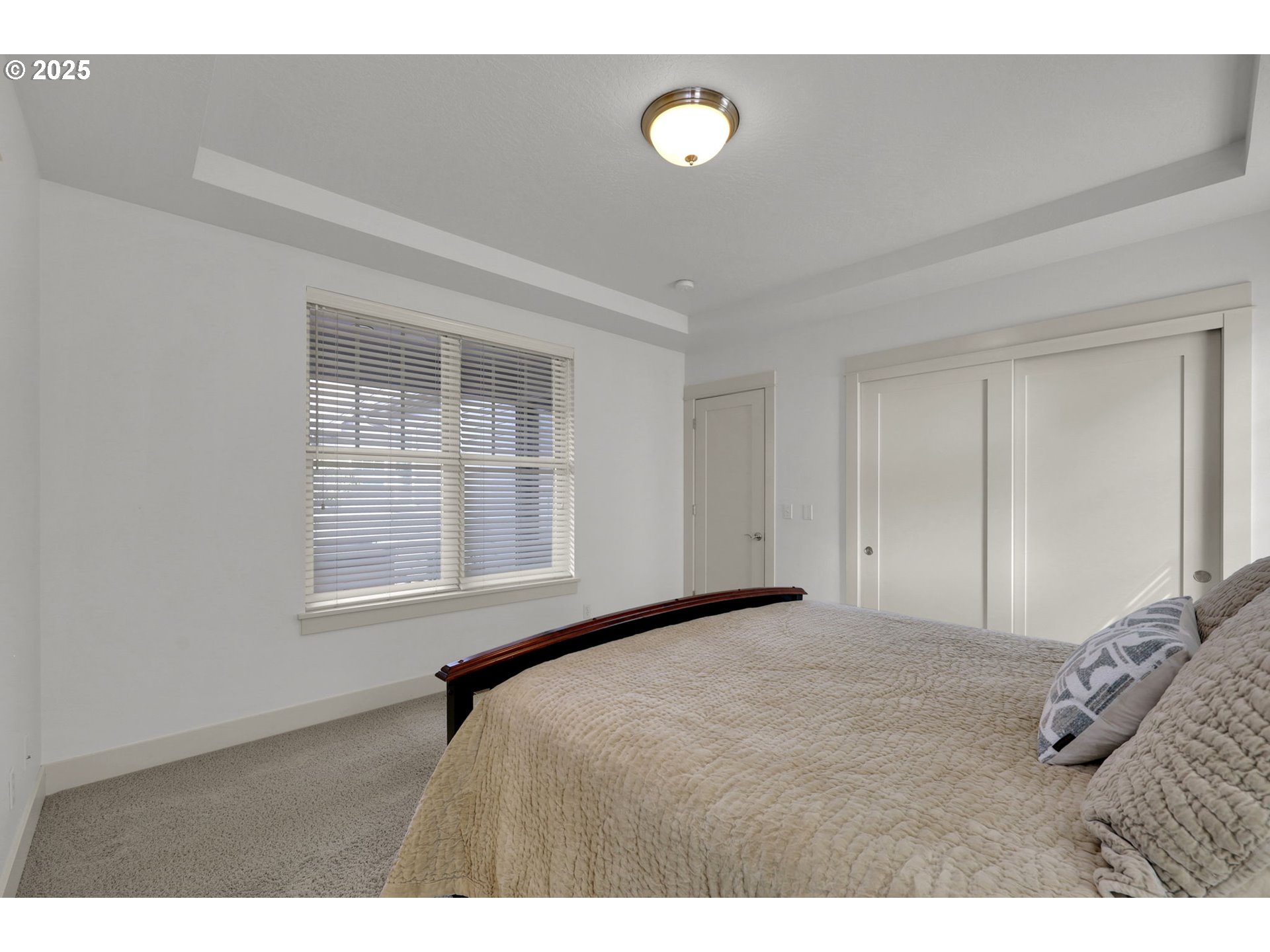 1260 Little John Lane Eugene, OR 97401 - Photo 22 of 44 a bedroom with a bed and a window