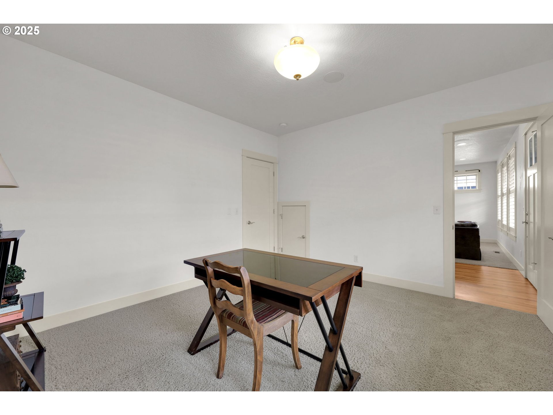1260 Little John Lane Eugene, OR 97401 - Photo 30 of 44 a view of a dining room with furniture and wooden floor