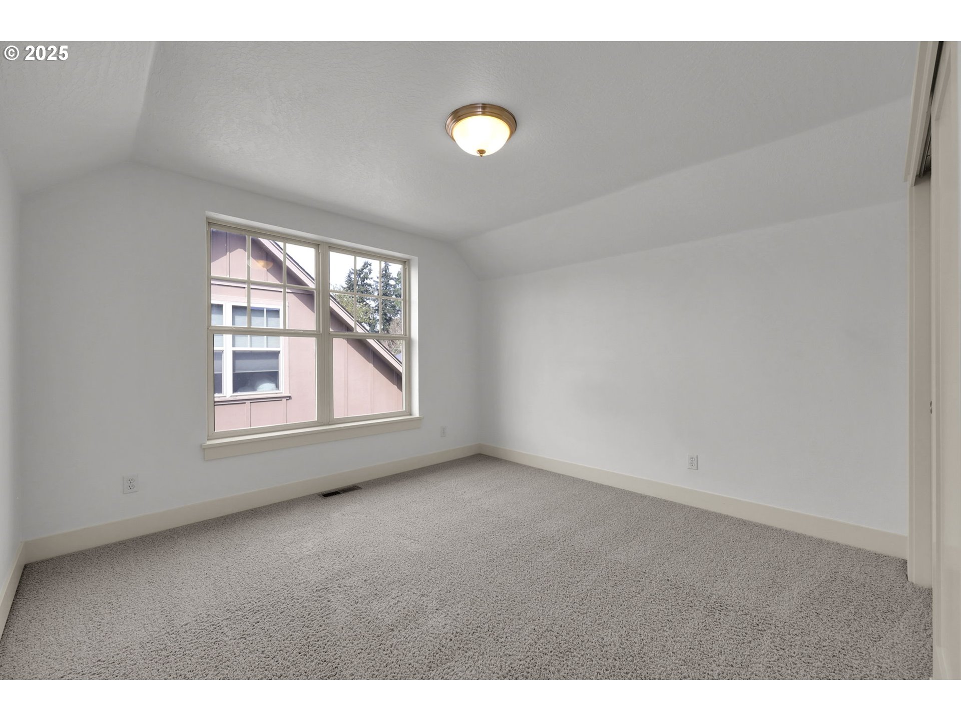 1260 Little John Lane Eugene, OR 97401 - Photo 32 of 44 a view of an empty room with a window