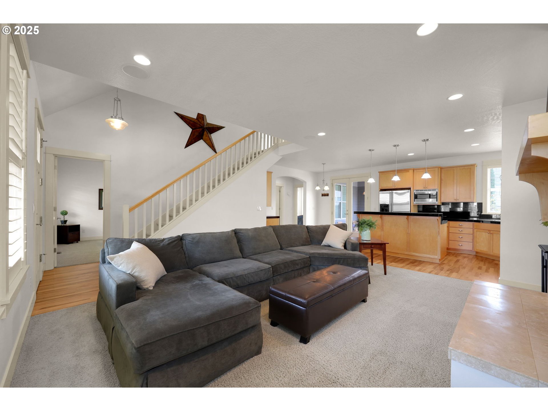 1260 Little John Lane Eugene, OR 97401 - Photo 7 of 44 a living room with furniture and kitchen view with wooden floor