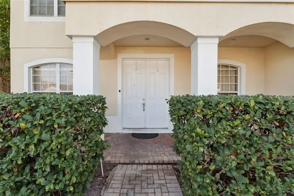 a view of a pathway in front of a house