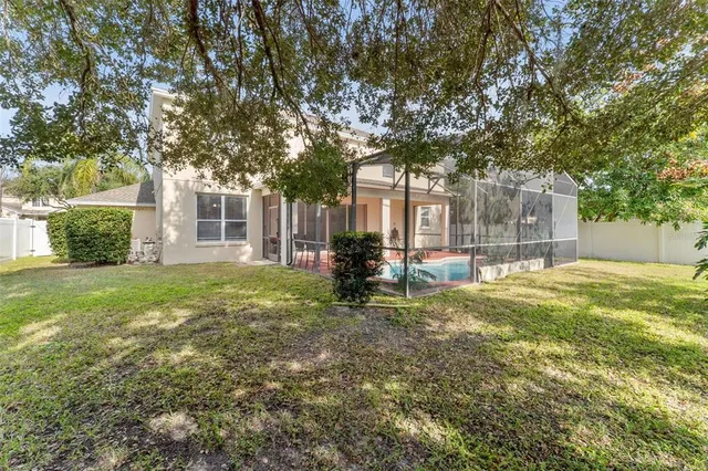 a view of a yard in front of a house