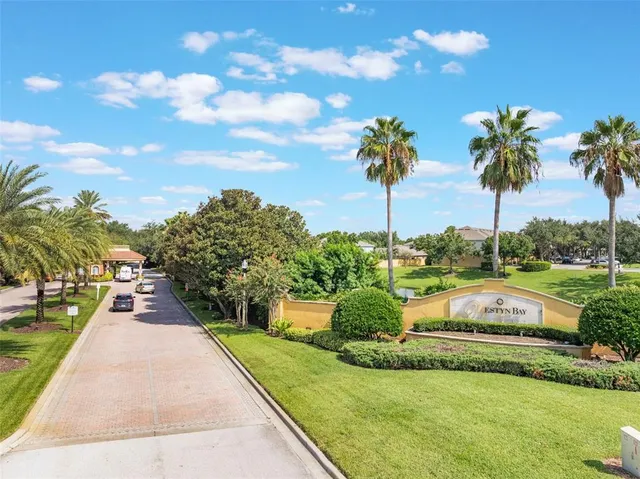 a view of a swimming pool with a garden