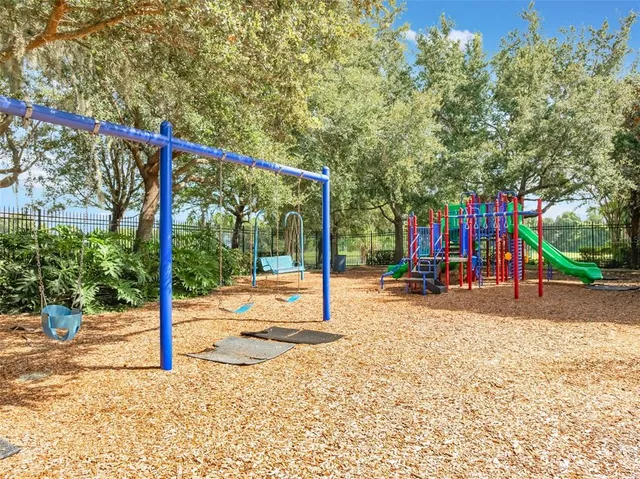 a view of a park with swings