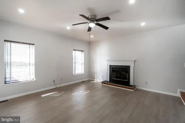 a view of a kitchen with a stove cabinets and a kitchen