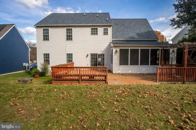 a view of a house with a fence