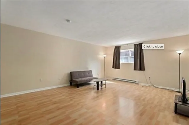 a view of livingroom with furniture and windows