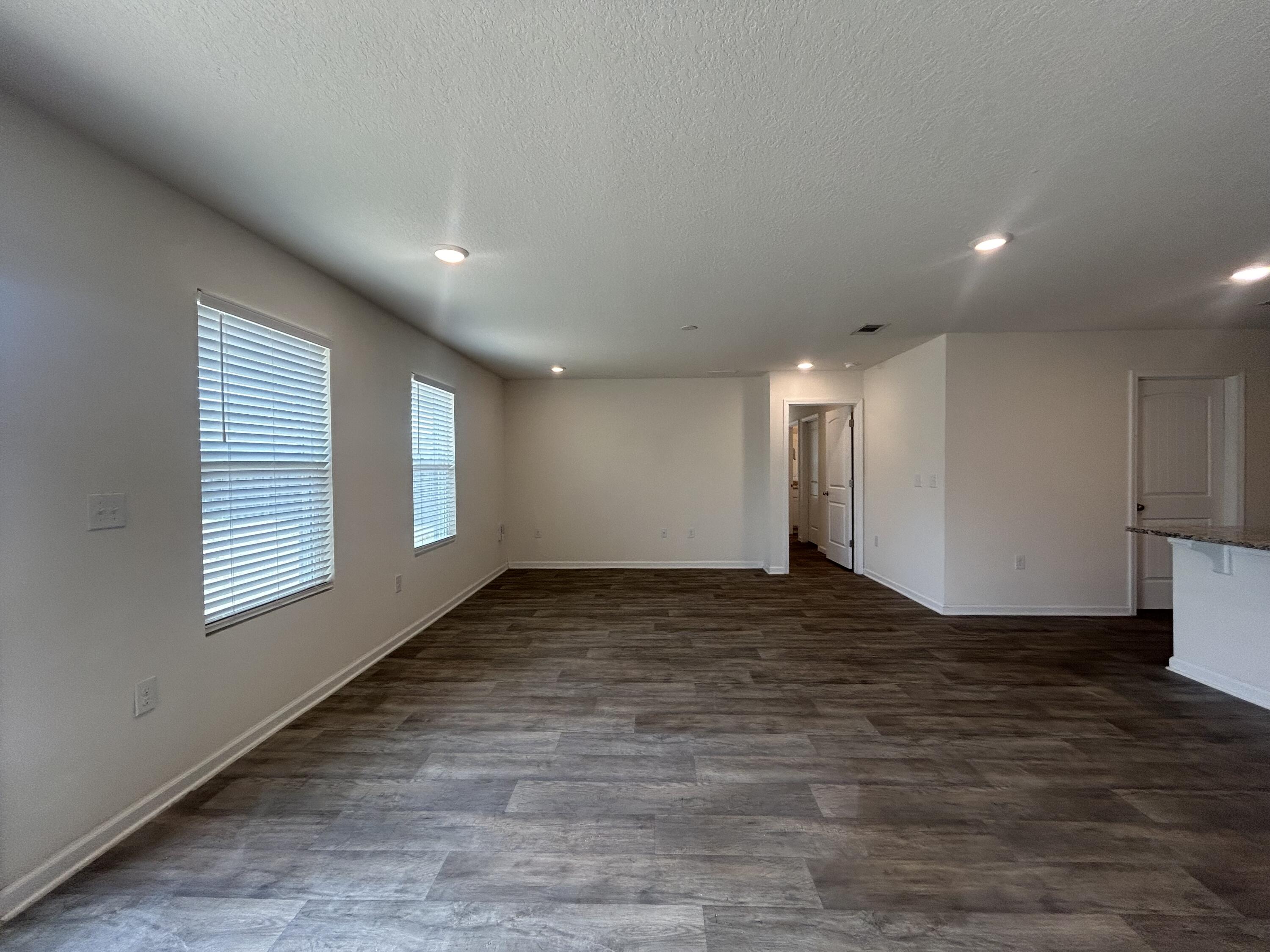916 Merganser Way Crestview, FL 32539 - Photo 16 of 37 a view of an empty room and a windows