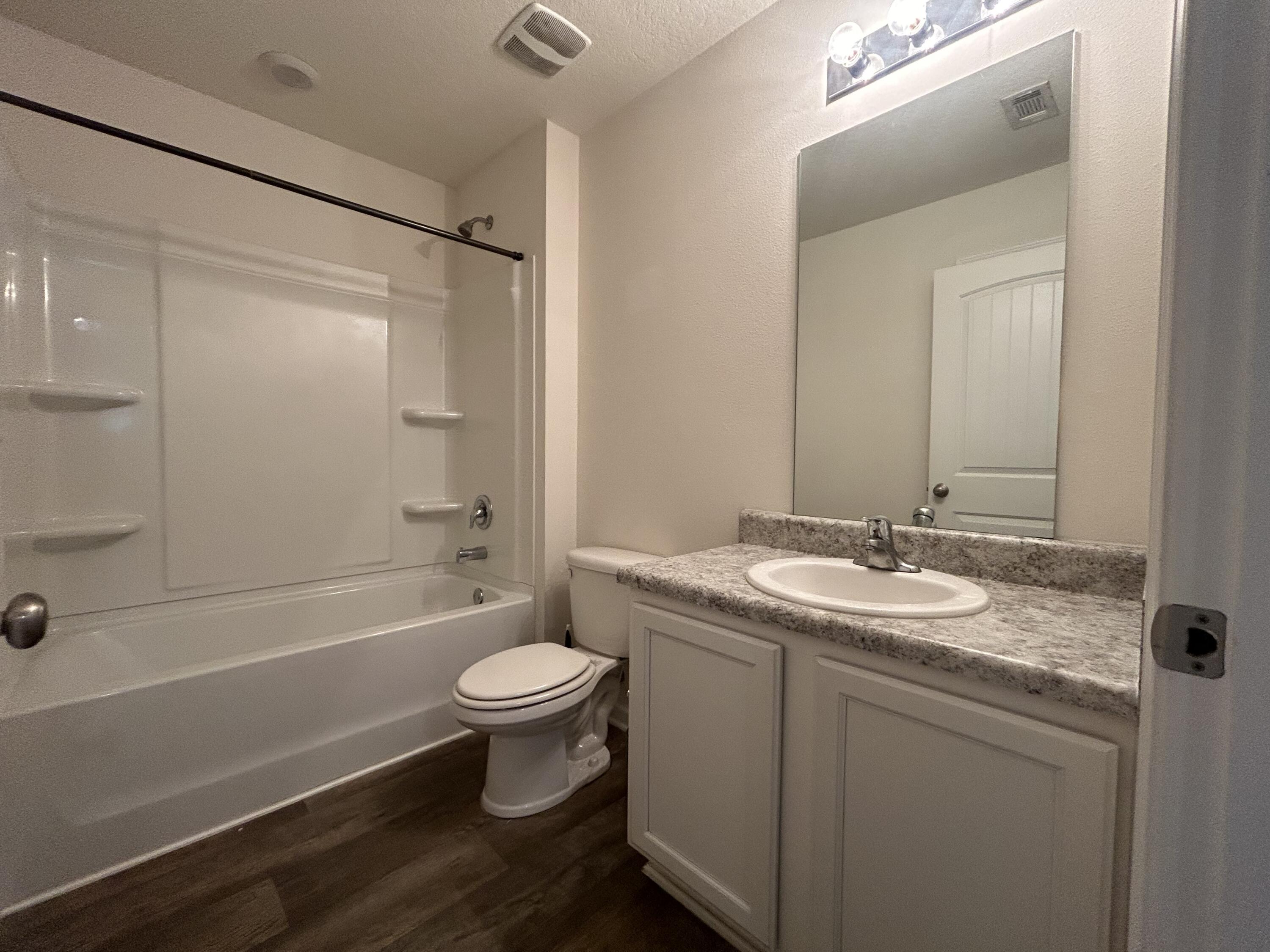 916 Merganser Way Crestview, FL 32539 - Photo 24 of 37 a bathroom with a sink a toilet and shower