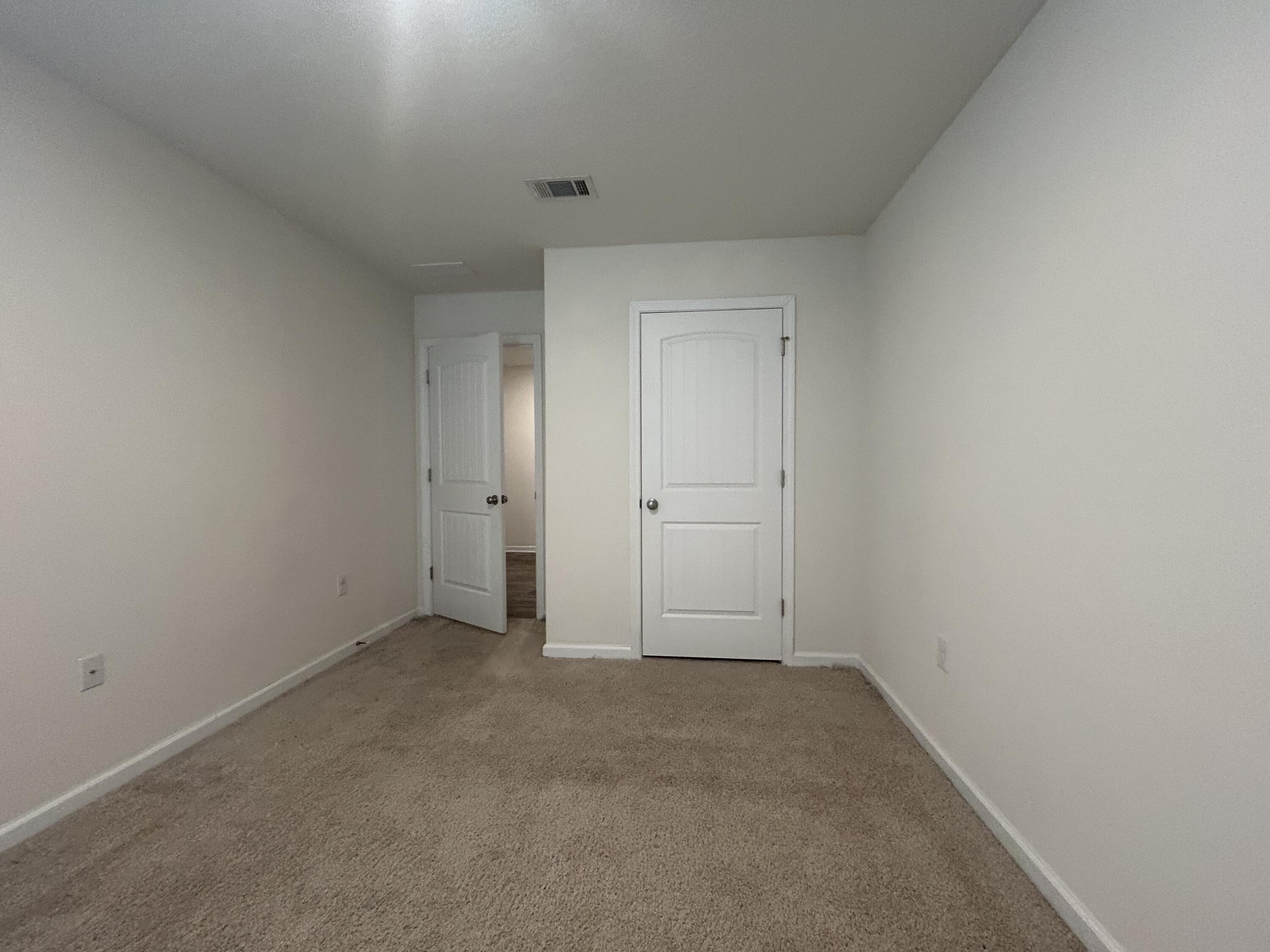 916 Merganser Way Crestview, FL 32539 - Photo 28 of 37 an empty room with an entryway