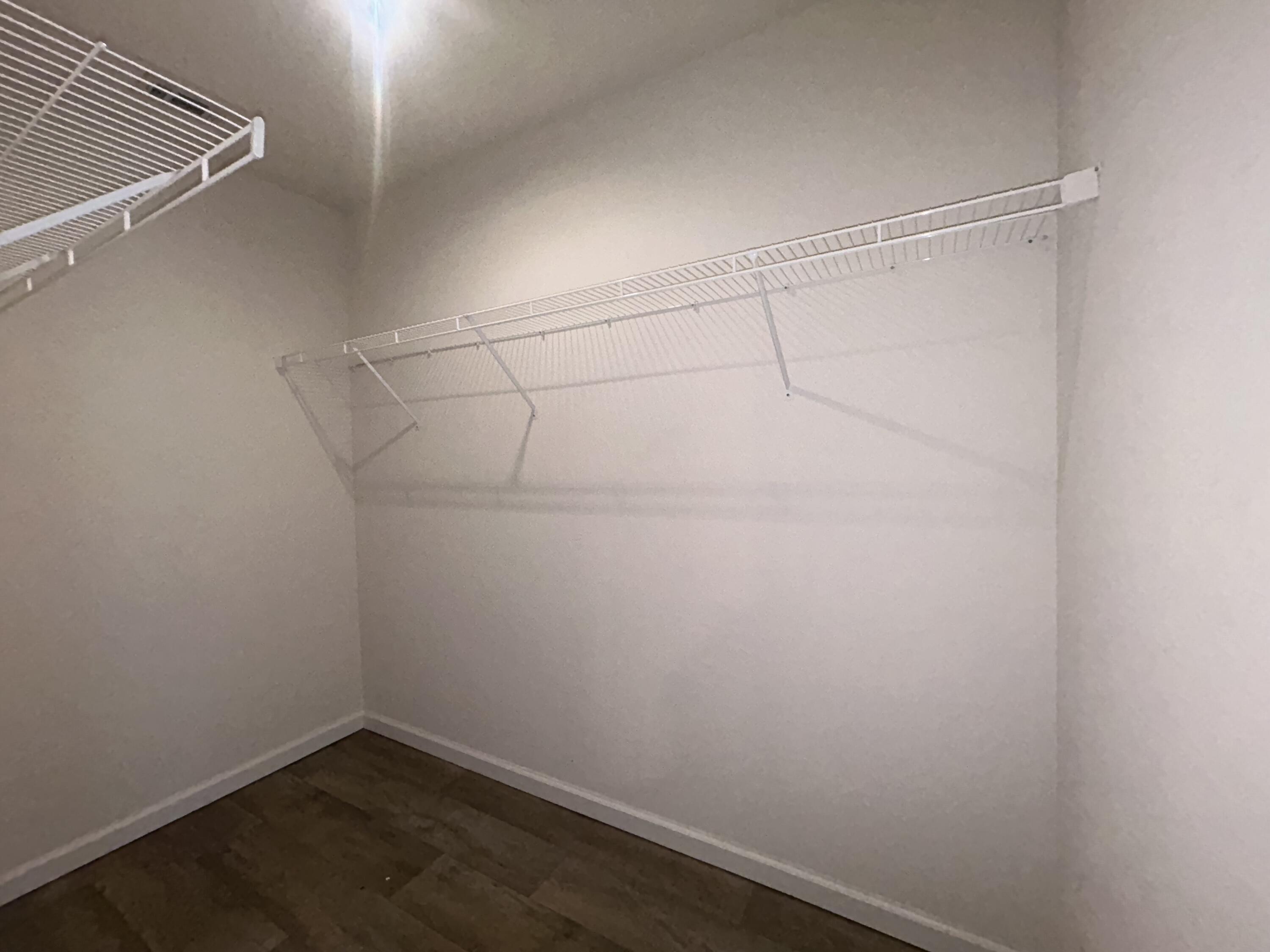 916 Merganser Way Crestview, FL 32539 - Photo 33 of 37 a view of a room with racks on the wall