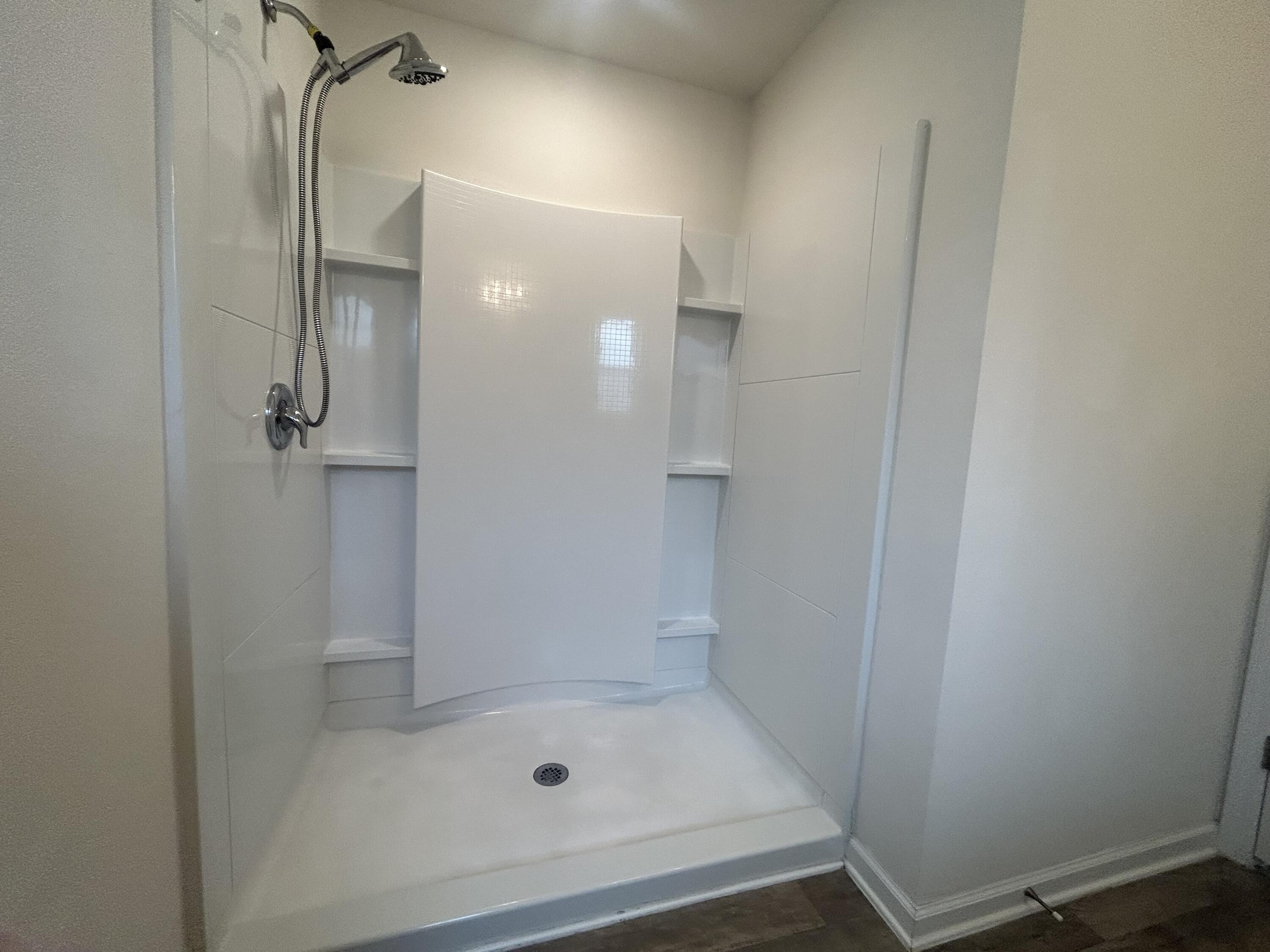 916 Merganser Way Crestview, FL 32539 - Photo 35 of 37 a bathroom with a glass shower door