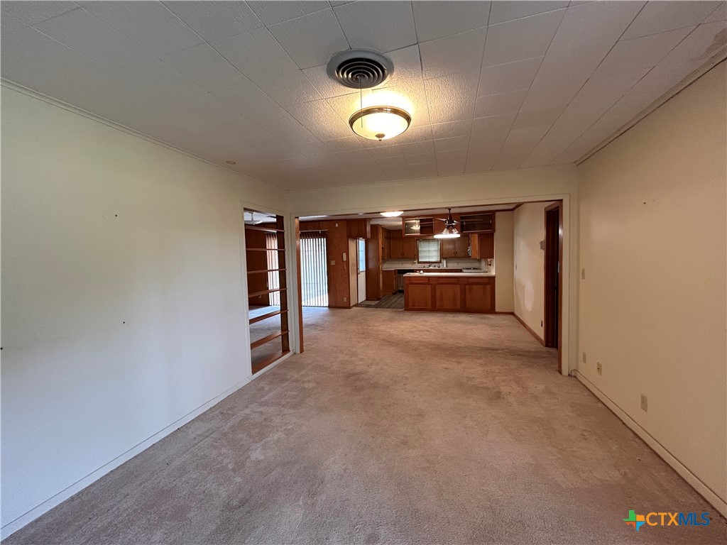 614 Apollo Drive Edna, TX 77957 - Photo 11 of 41 a view of empty room with windows
