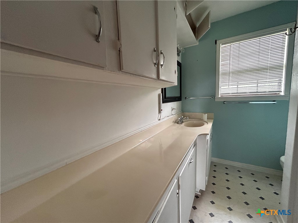 614 Apollo Drive Edna, TX 77957 - Photo 34 of 41 a utility room with a window dryer and washer