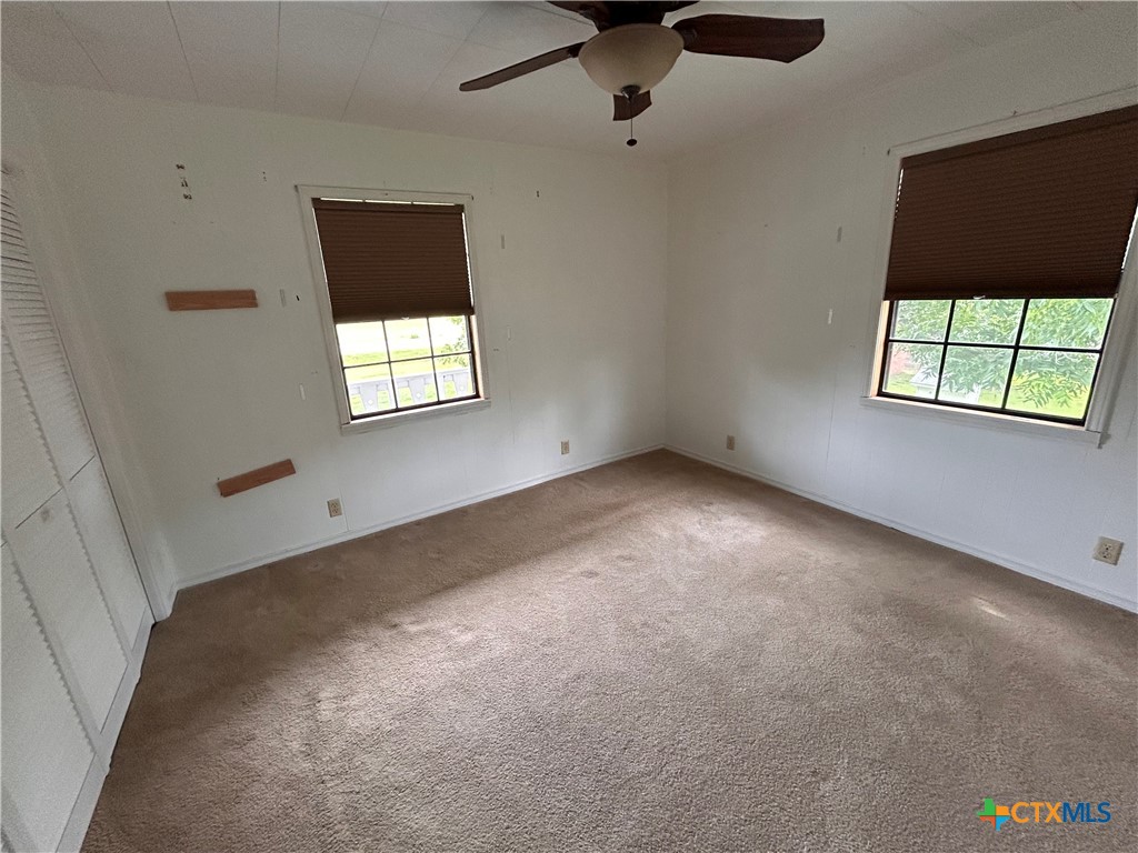 614 Apollo Drive Edna, TX 77957 - Photo 35 of 41 an empty room with a window