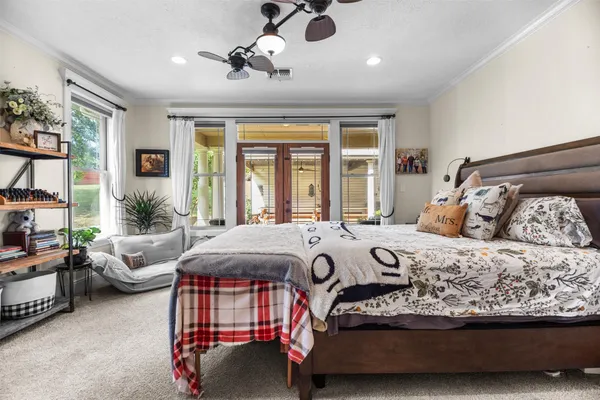 a bedroom with a bed and furniture