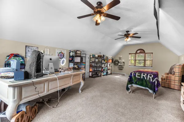 a bedroom with furniture