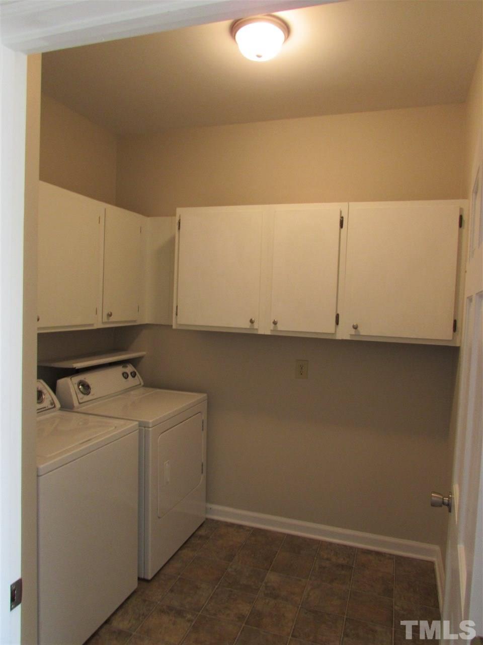 644 Weathergreen Drive Raleigh, NC 27615 - Photo 14 of 24 a utility room with dryer and washer