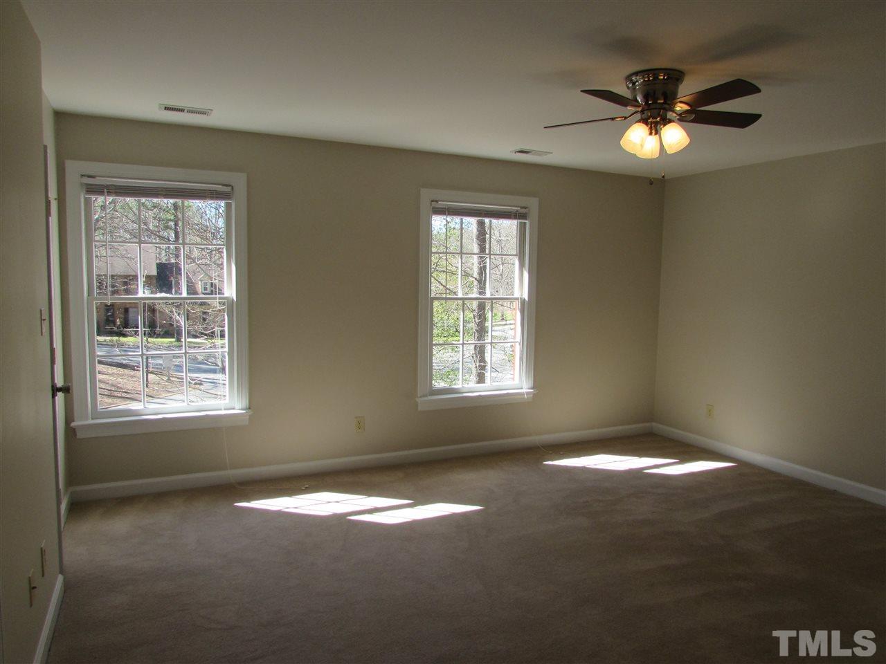 644 Weathergreen Drive Raleigh, NC 27615 - Photo 15 of 24 a view of an empty room with a window