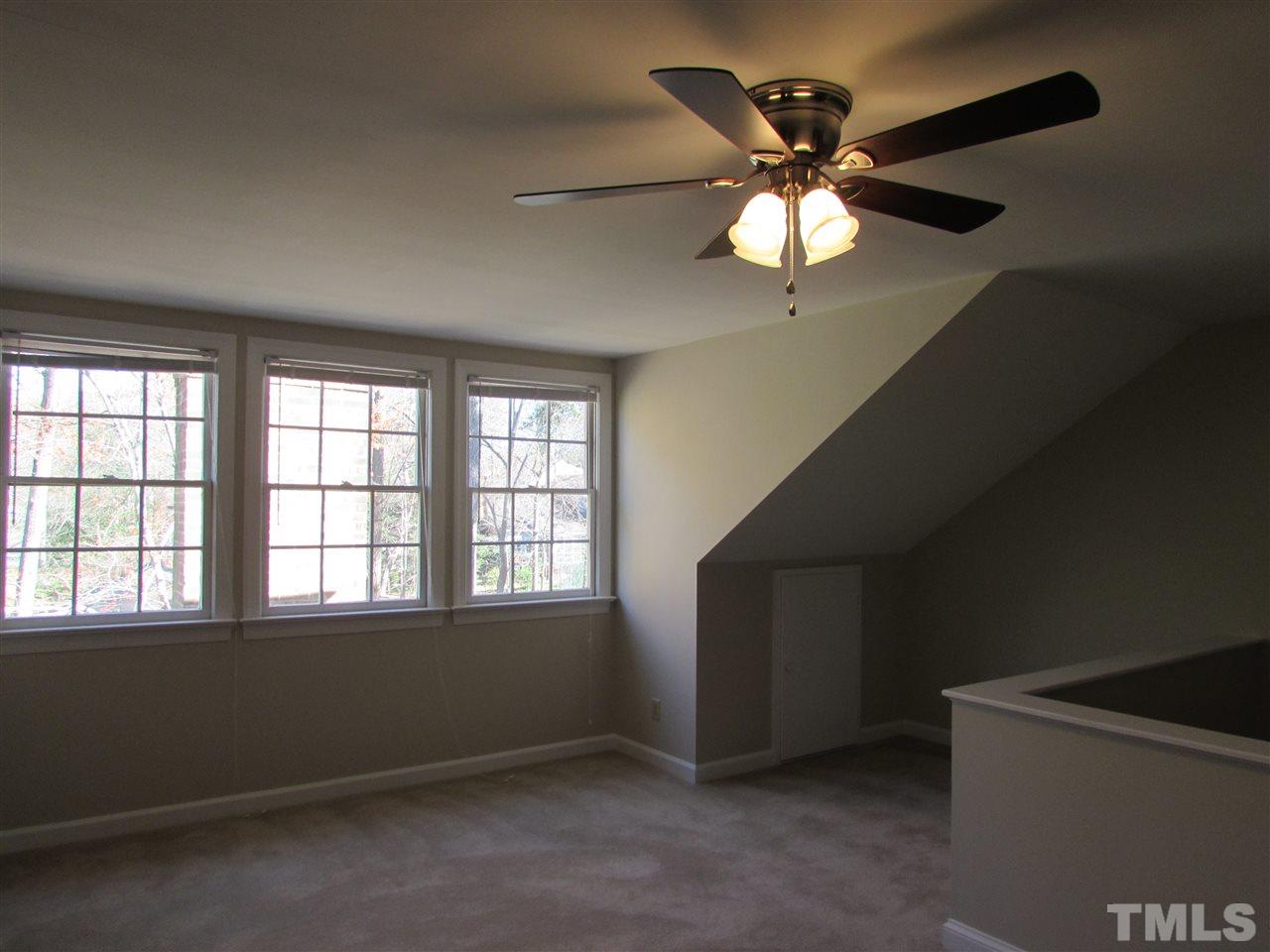 644 Weathergreen Drive Raleigh, NC 27615 - Photo 22 of 24 wooden floor in an empty room with a window