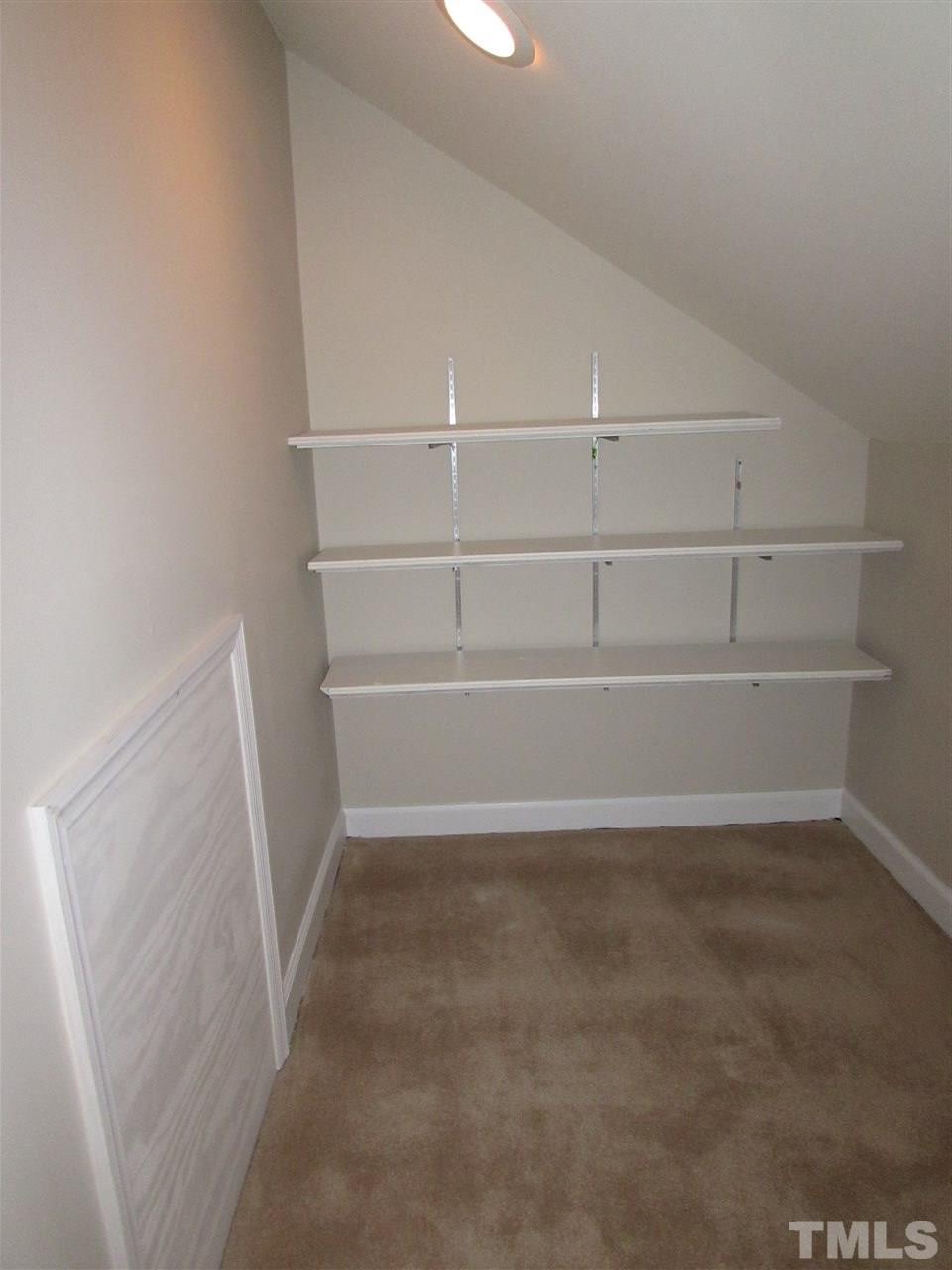 644 Weathergreen Drive Raleigh, NC 27615 - Photo 23 of 24 a view of an empty walk in closet