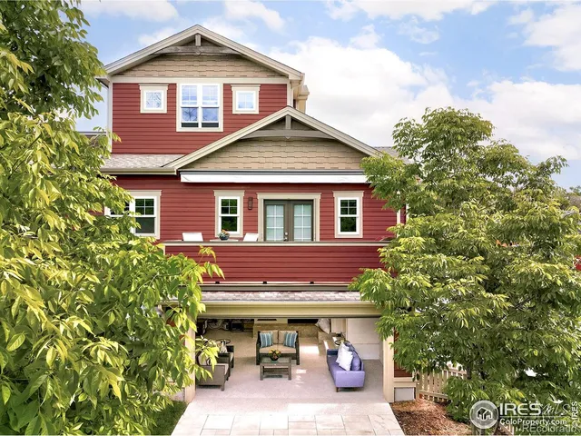 a view of house with outdoor seating