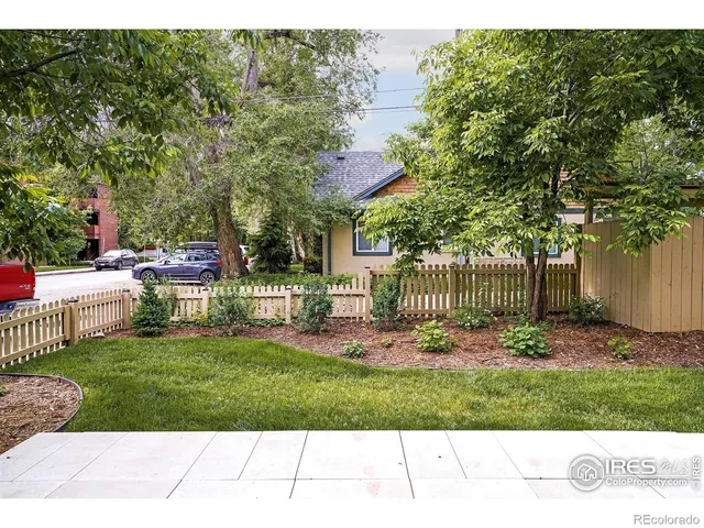 a garden view with a seating space