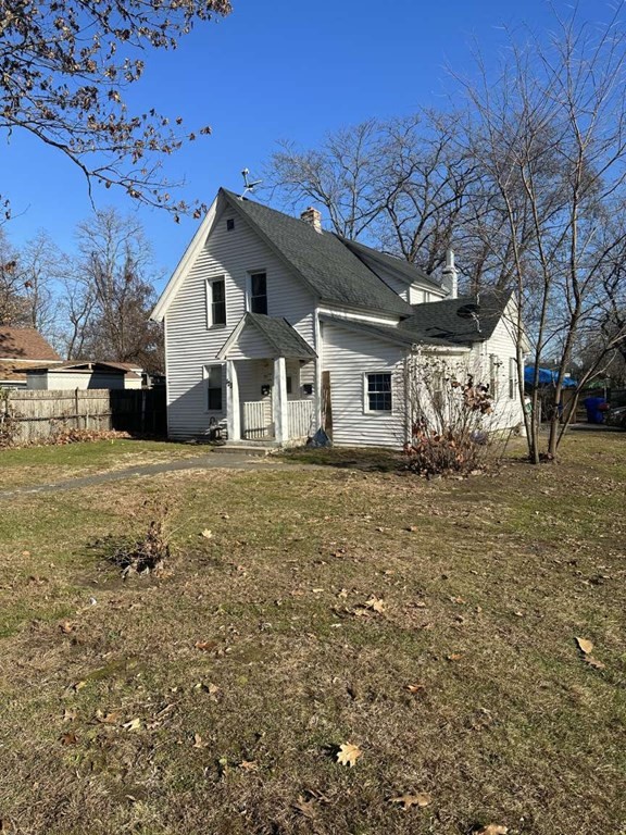 123 Pine Street Springfield, MA 01105 - Photo 2 of 5 a view of a house with a yard