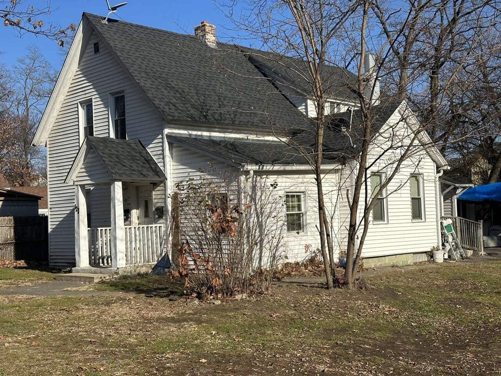 123 Pine Street Springfield, MA 01105 - Photo 3 of 5 a view of a house with a yard