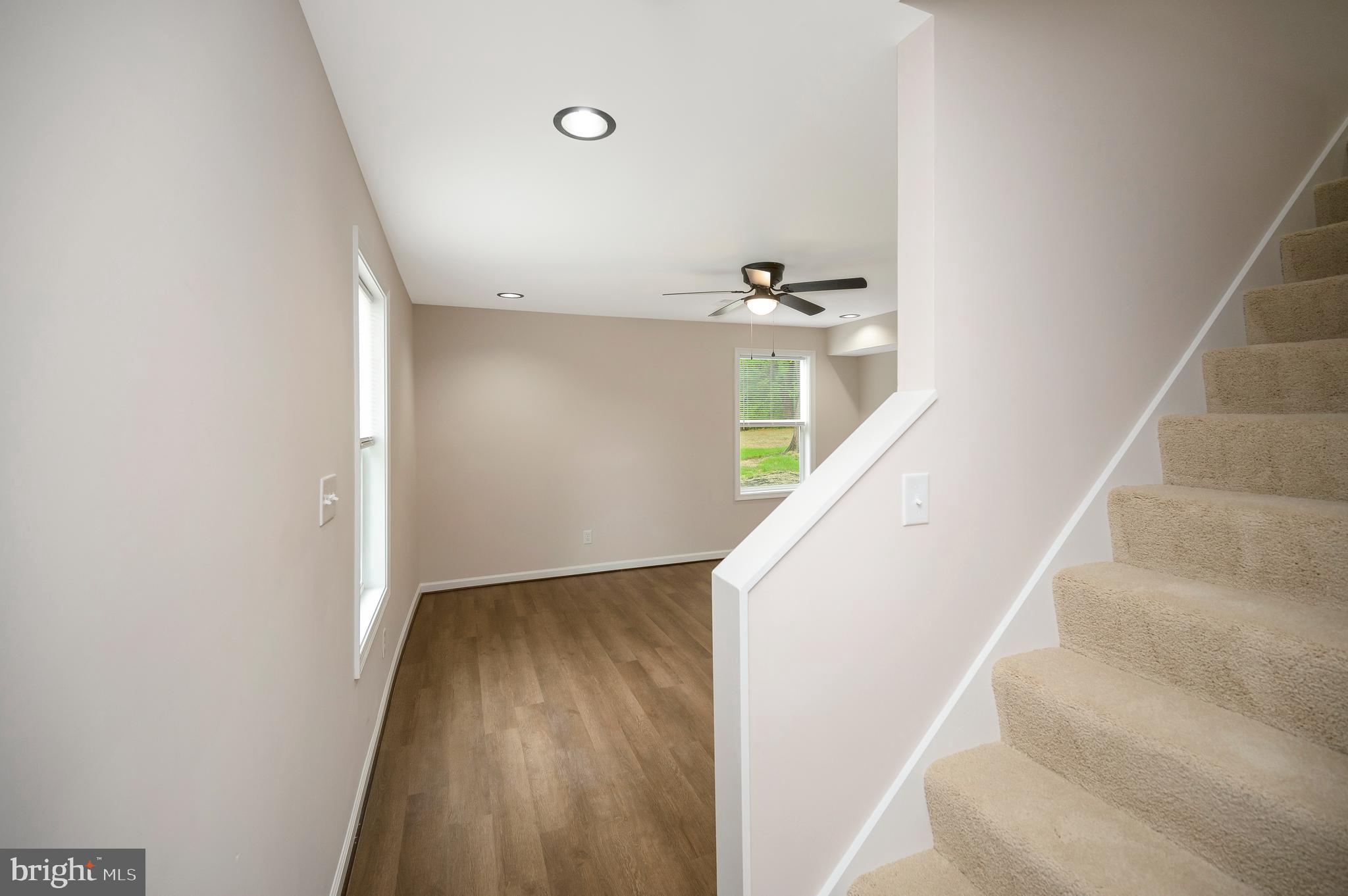 14169 Silver Hill Road Sumerduck, VA 22742 - Photo 5 of 40 a view of a hallway with staircase