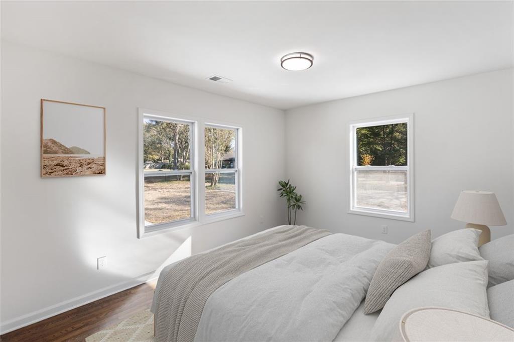 159 Pine Valley Road Bogart, GA 30622 - Photo 18 of 40 a bedroom with a bed and a window