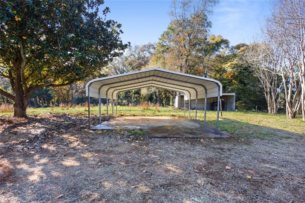 159 Pine Valley Road Bogart, GA 30622 - Photo 31 of 38 a view of house with a yard