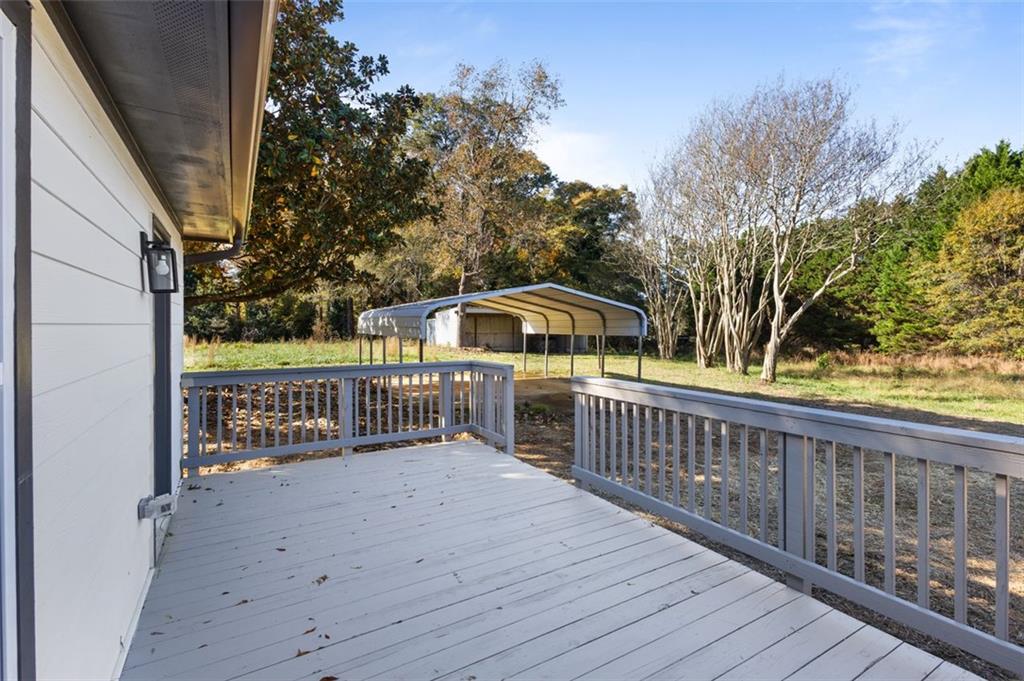159 Pine Valley Road Bogart, GA 30622 - Photo 31 of 40 a view of street with wooden deck