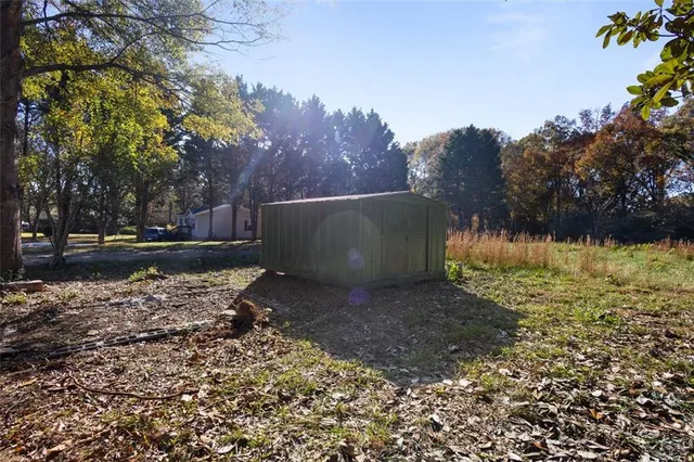 a view of backyard with green space