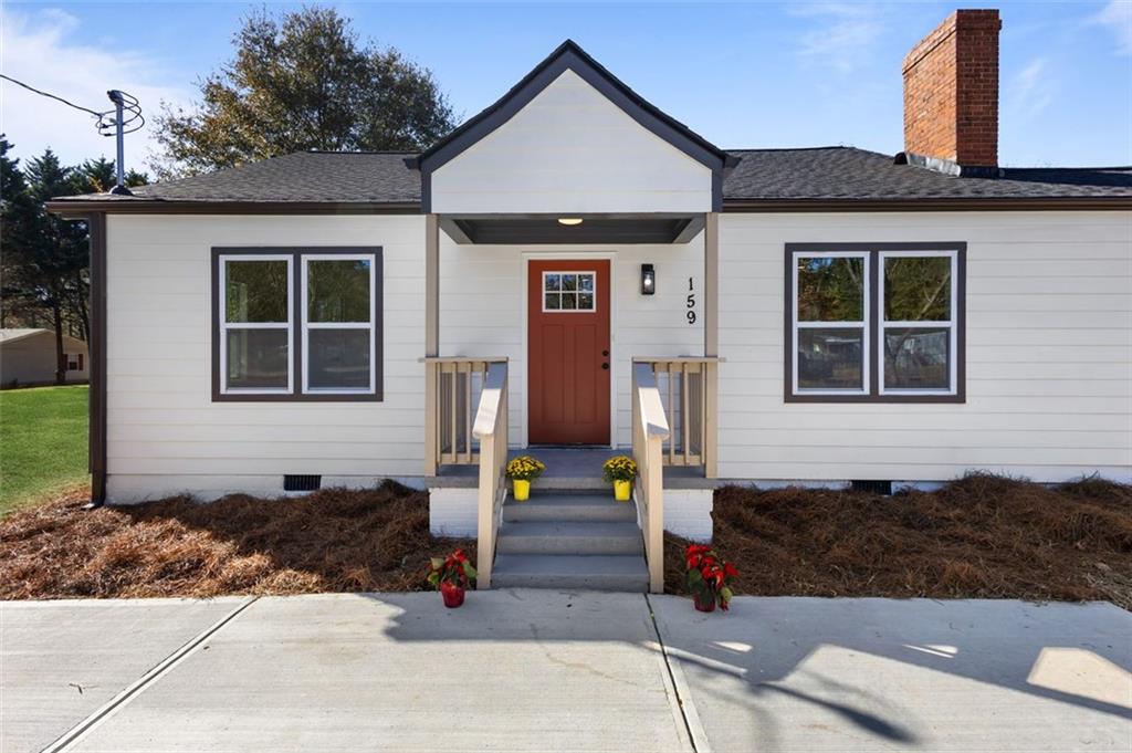 159 Pine Valley Road Bogart, GA 30622 - Photo 4 of 40 a front view of a house with a yard