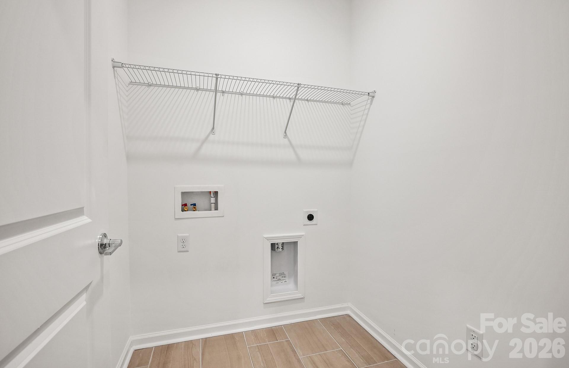 1805 Riverbend Avenue Monroe, NC 28110 - Photo 12 of 18 a view of a room with racks on the wall