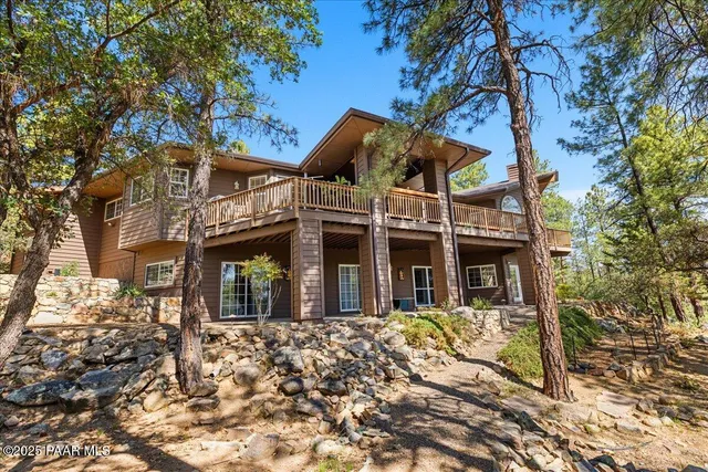 a view of a wrought iron fences in front of house