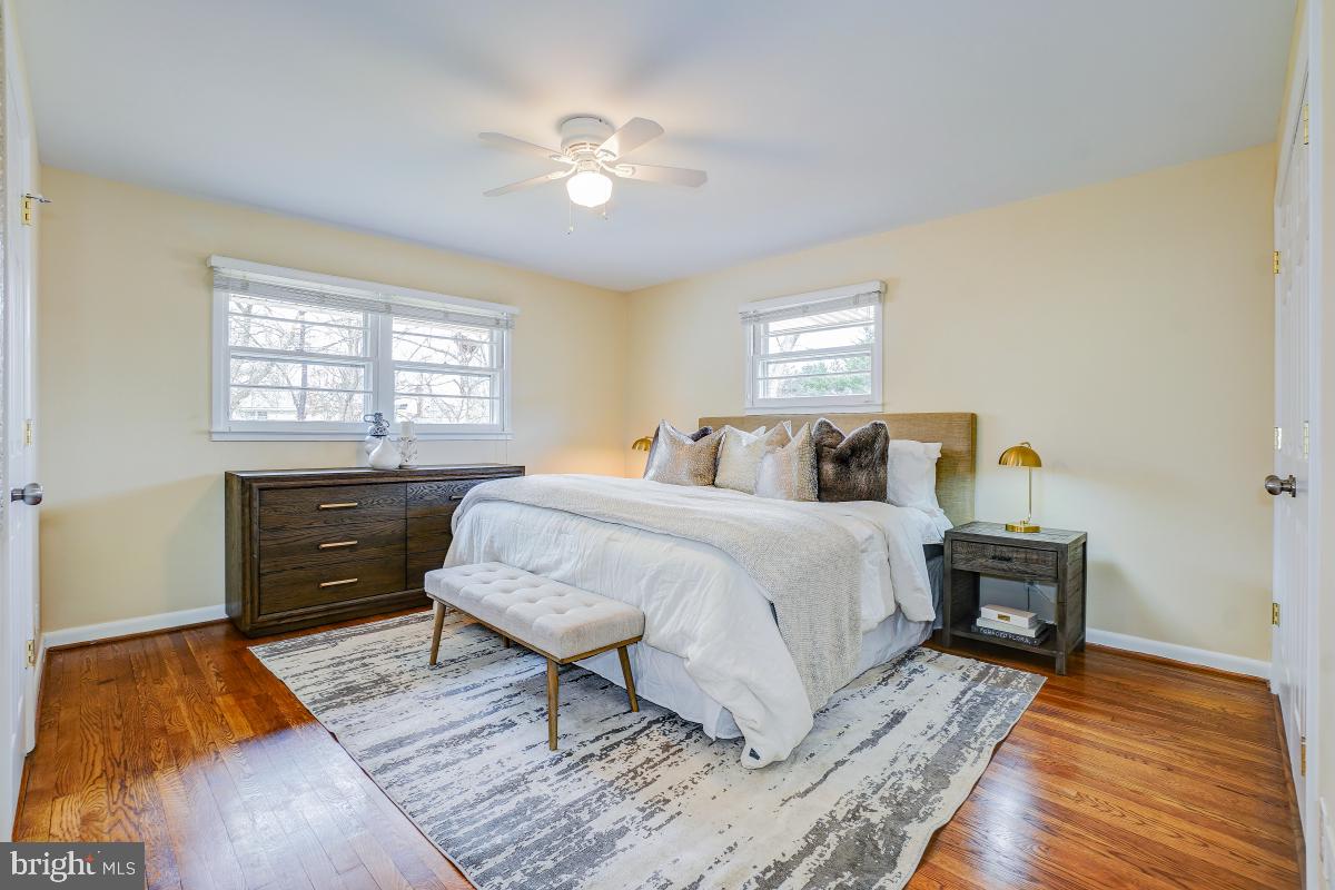 6503 Dryden Drive McLean, VA 22101 - Photo 17 of 34 a bedroom with a bed and wooden floor