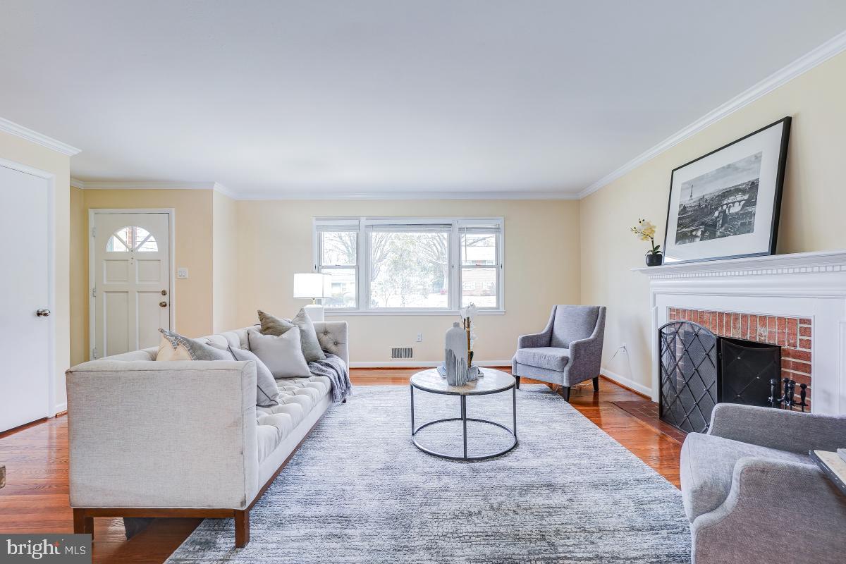 6503 Dryden Drive McLean, VA 22101 - Photo 5 of 34 a living room with furniture and a fireplace