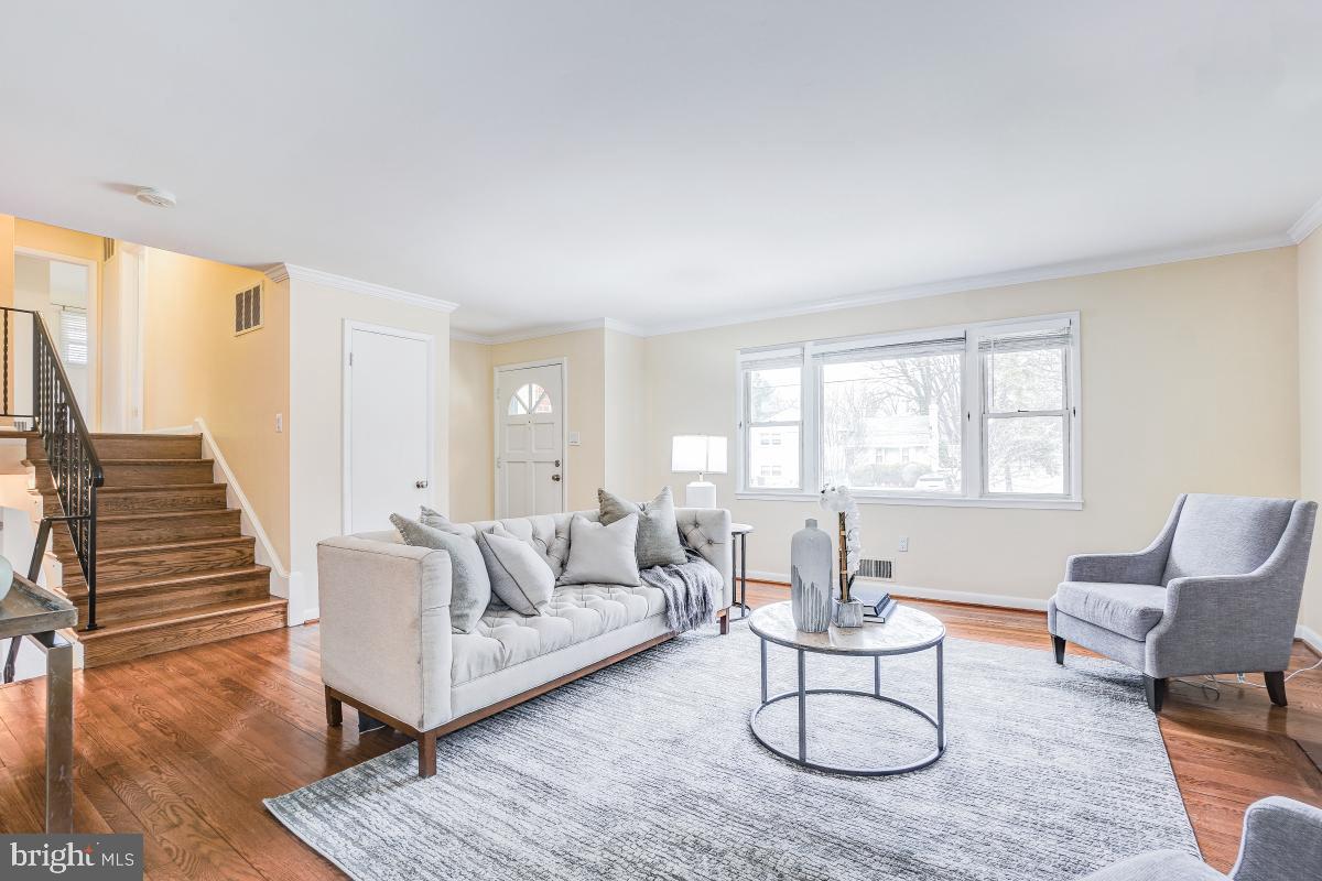 6503 Dryden Drive McLean, VA 22101 - Photo 6 of 34 a living room with furniture and wooden floor