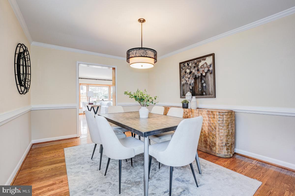 6503 Dryden Drive McLean, VA 22101 - Photo 7 of 34 a view of a dining room with furniture and wooden floor