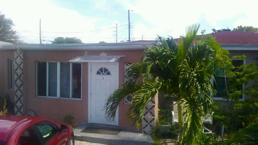 152 West 27th Street Riviera Beach, FL 33404 - Photo 2 of 8 Front
